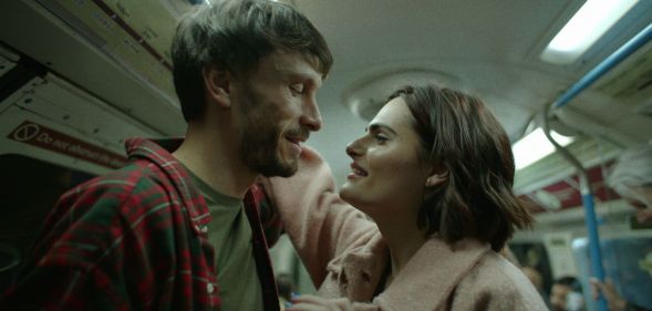 Nava Mau grips Richard Gadd's hand in a still from Netflix show Baby Reindeer.