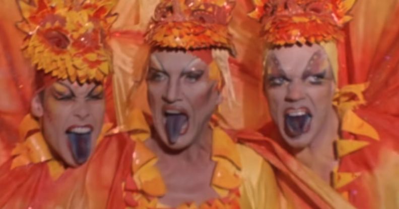 The main trio of Priscilla Queen of the Desert, sticking their tongues out during a performance in drag.