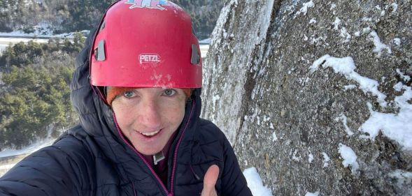 Image of trans forest ranger and climber Robbi Mecus
