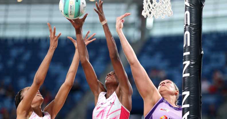 A group of women playing netball