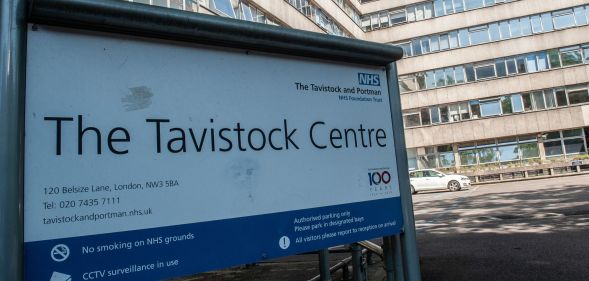 A sign outside of the Tavistock and Portman NHS Foundation Trust, which houses England's only trans youth clinic. The sign reads "The Tavistock Centre" along with an address and notices about CCTV.