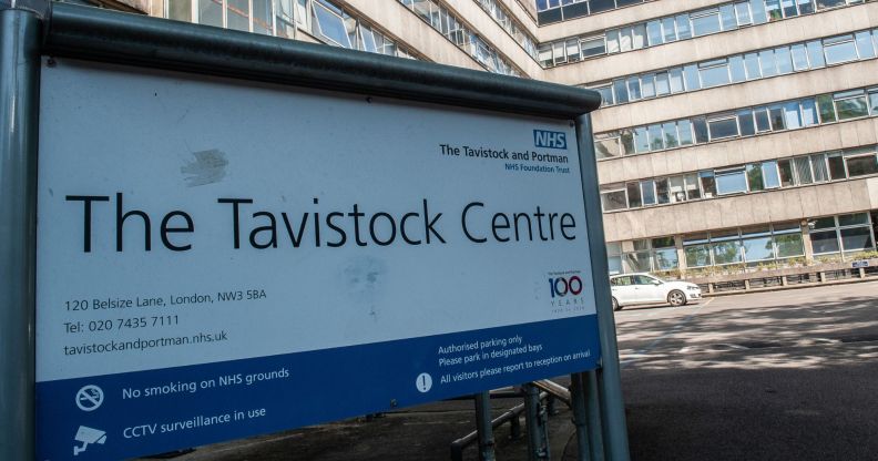 A sign outside of the Tavistock and Portman NHS Foundation Trust, which houses England's only trans youth clinic. The sign reads "The Tavistock Centre" along with an address and notices about CCTV.