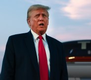 ATLANTA, GEORGIA - AUGUST 24: Former U.S. President Donald Trump speaks to the media at Atlanta Hartsfield-Jackson International Airport after surrendering at the Fulton County jail on August 24, 2023 in Atlanta, Georgia. Trump was booked on multiple charges related to an alleged plan to overturn the results of the 2020 presidential election in Georgia. (Photo by Joe Raedle/Getty Images)