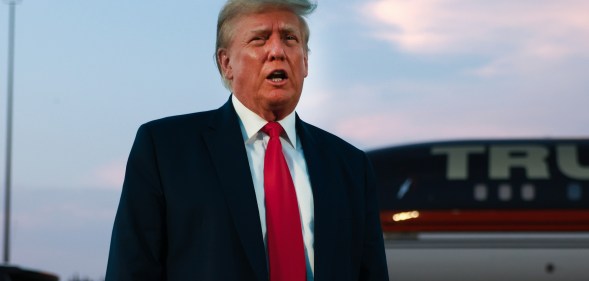 ATLANTA, GEORGIA - AUGUST 24: Former U.S. President Donald Trump speaks to the media at Atlanta Hartsfield-Jackson International Airport after surrendering at the Fulton County jail on August 24, 2023 in Atlanta, Georgia. Trump was booked on multiple charges related to an alleged plan to overturn the results of the 2020 presidential election in Georgia. (Photo by Joe Raedle/Getty Images)
