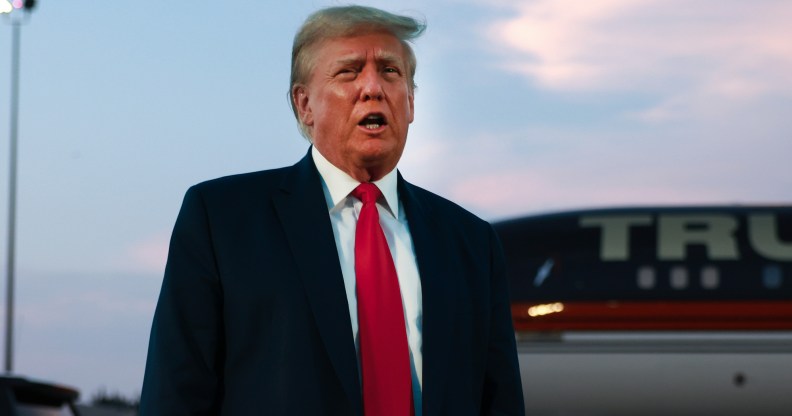 ATLANTA, GEORGIA - AUGUST 24: Former U.S. President Donald Trump speaks to the media at Atlanta Hartsfield-Jackson International Airport after surrendering at the Fulton County jail on August 24, 2023 in Atlanta, Georgia. Trump was booked on multiple charges related to an alleged plan to overturn the results of the 2020 presidential election in Georgia. (Photo by Joe Raedle/Getty Images)