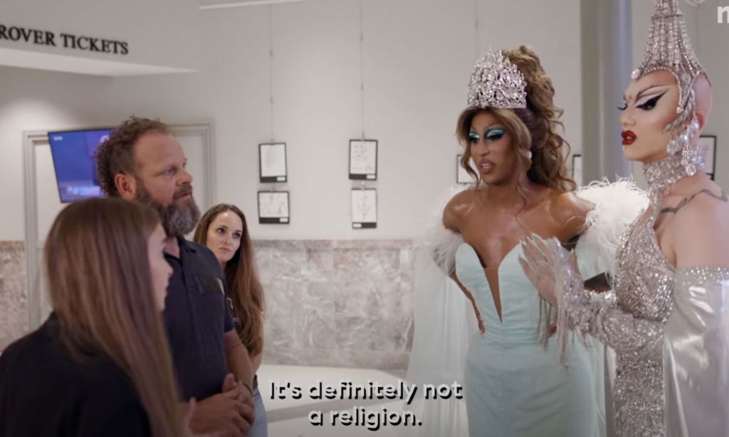 Screenshot from We're Here season 4 featuring Priyanka and Sasha Velour talking to anti-drag protestors.