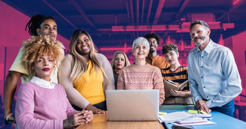 This is a diverse group of colleagues gathered around a table.