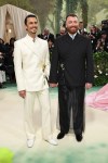 Sam Smith makes their Met Gala red carpet debut with Christian Cowan
in a matching couple look