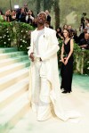 Umm, Lil Nas X and Troye Sivan just shared a Met Gala moment and fans
are begging for a collaboration