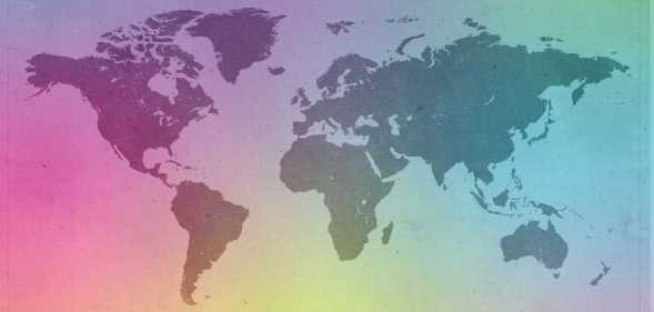 a global map in a rainbow hue