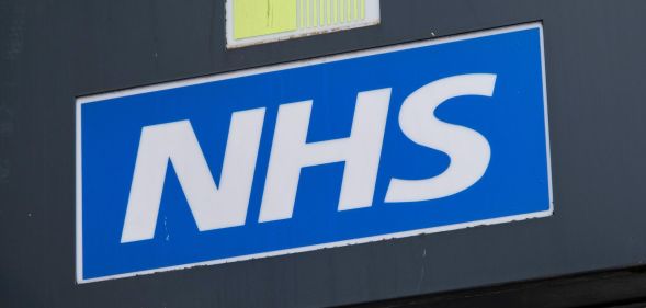 NHS Logo on blue background