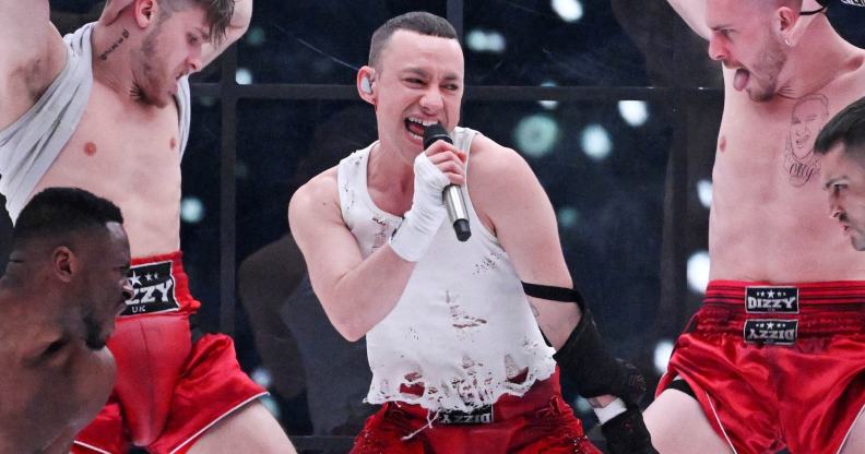 Olly Alexander representing Great Britain with the entry 'Dizzy' performs on stage during the first rehearsal for the first semi-final of the 68th edition of the Eurovision Song Contest (ESC) at the Malmo Arena, in Malmo, Sweden, on May 6, 2024. A week of Eurovision Song Contest festivities kicked off Saturday, on May 4, in the southern Swedish town of Malmo, with 37 countries taking part. The first semi-final takes place on Tuesday, May 7, the second on Thursday, May 9, and the grand final concludes the event on May 11. (Photo by Jessica GOW / TT News Agency / AFP) / Sweden OUT