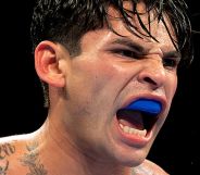 Ryan Garcia, with a gum shield, screaming.