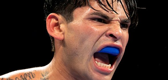 Ryan Garcia, with a gum shield, screaming.