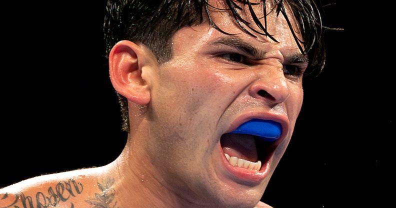 Ryan Garcia, with a gum shield, screaming.
