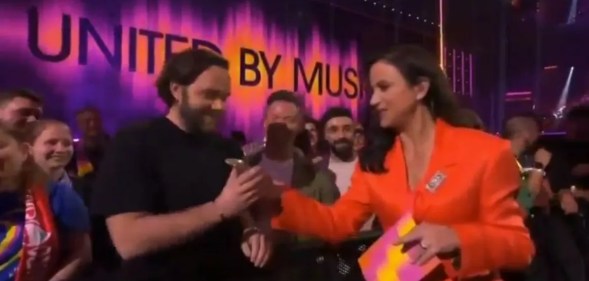 The hilarious moment was caught on live TV. (Eurovision/BBC)