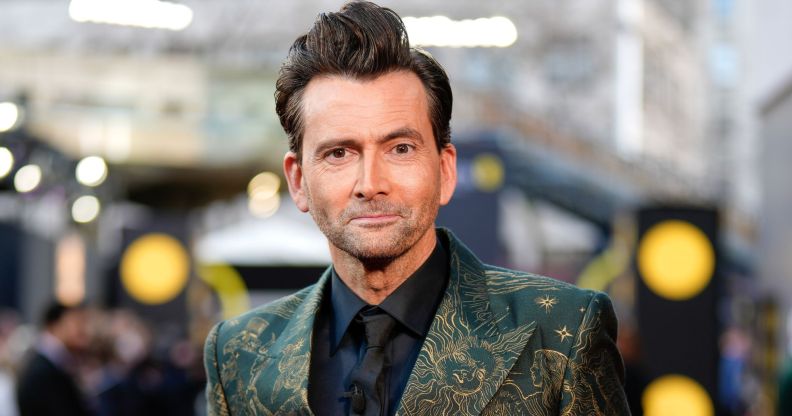 Doctor Who star David Tennant smiles on the red carpet at the 2024 BAFTA Awards.