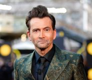 Doctor Who star David Tennant smiles on the red carpet at the 2024 BAFTA Awards.