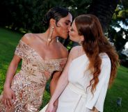 Alex Scott and Jess Glynne kiss at the amfAR Cannes Gala.