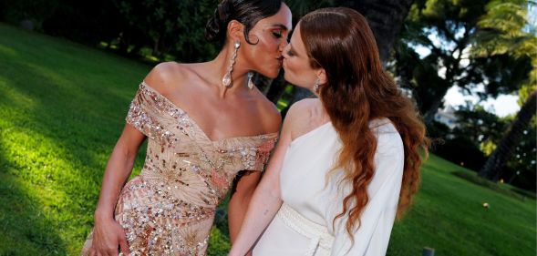 Alex Scott and Jess Glynne kiss at the amfAR Cannes Gala.