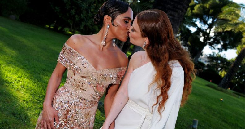 Alex Scott and Jess Glynne kiss at the amfAR Cannes Gala.