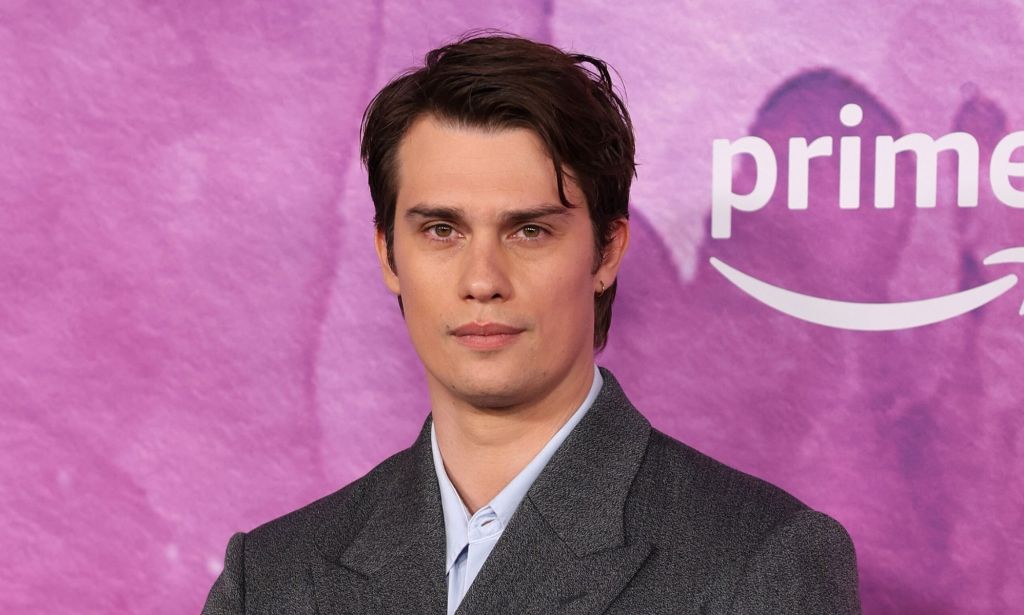 Nicholas Galitzine poses on the red carpet at the 