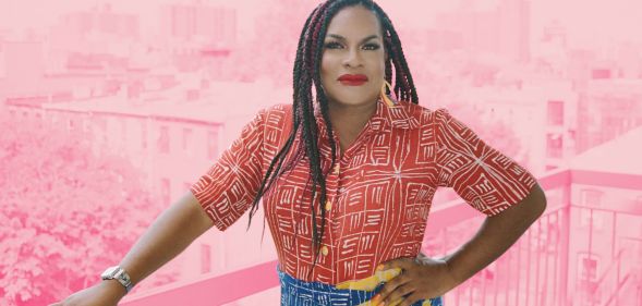 This is an image of a Black trans woman named Imara Jones. She is wearing a red shirt and a colourful skirt.