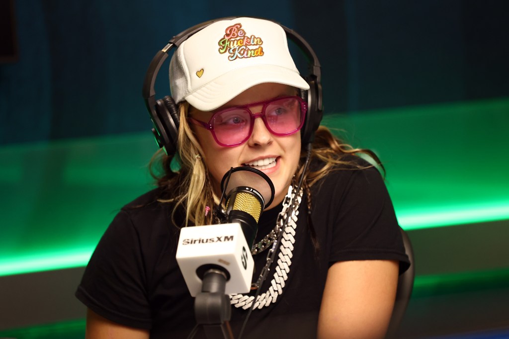 JoJo Siwa in a radio studio on the mic