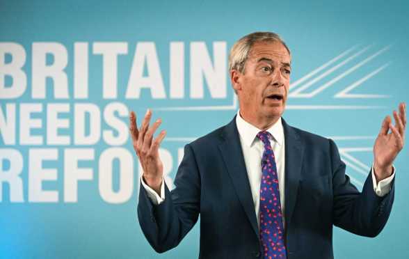 Leader of Reform UK Nigel Farage delivers a speech to launch the hard-right party's general election manifesto in Merthyr Tydfil, south Wales, on June 17, 2024, in the build-up to the UK general election on July 4. (Photo by JUSTIN TALLIS / AFP) (Photo by JUSTIN TALLIS/AFP via Getty Images)