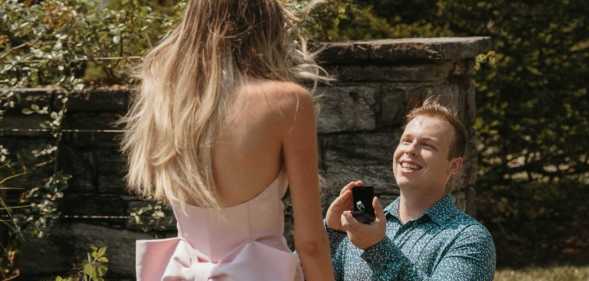 Addison Smith down on one knee proposing