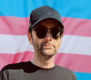 David Tennant and a trans rights flag