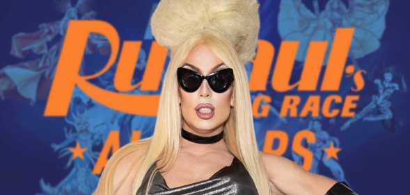 Alaska in front of the promo for All Stars 9