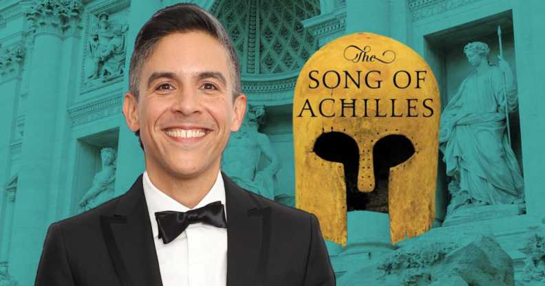 Director Matthew López alongside a Greek helmet from the cover of The Song of Achilles