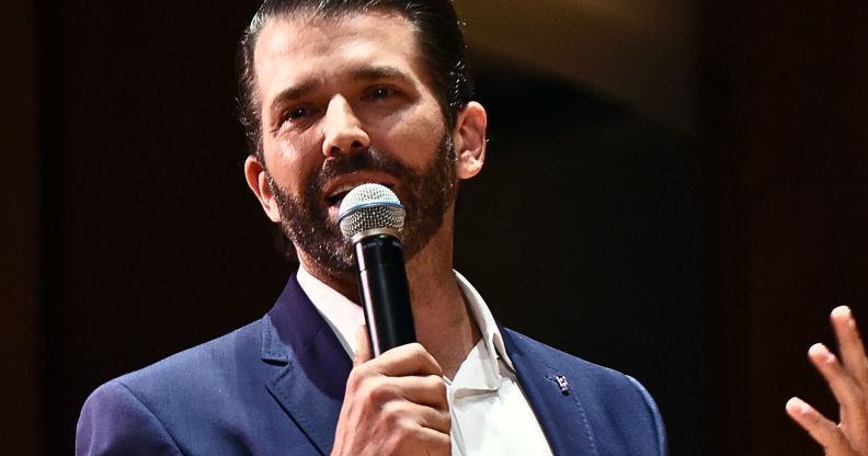Donald Trump Jr speaking into a microphone.