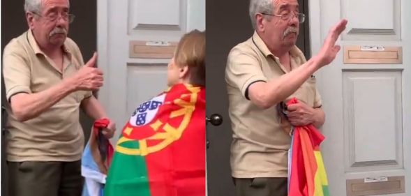 the elderly man waving his Pride flag.