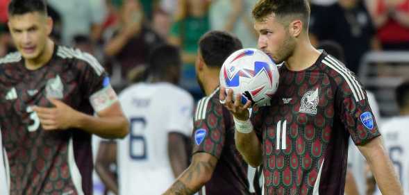 Santiago Gimenez of Mexico kiss the ball during the CONMEBOL Copa America group B match between Mexico and Ecuador at State Farm Stadium.
