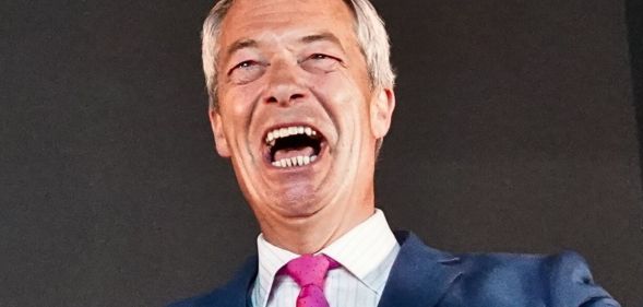 Nigel Farage laughing.