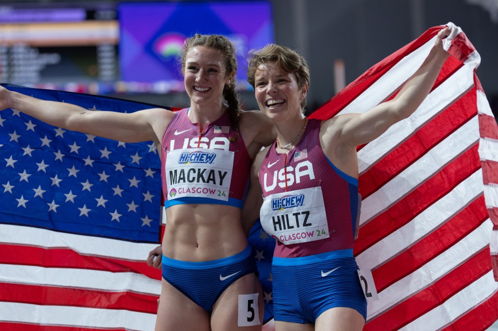 (L-R) Emily Mackay of the United States and Nikki Hiltz of the United States pose for photots following the Womens 1500m Final during day three of the World Athletics Indoor Championships at Emirates Arena on 3 March, 2024 in Glasgow, Scotland.