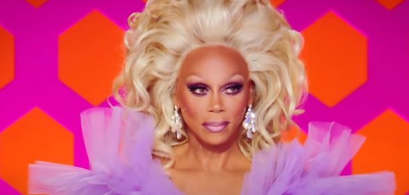 RuPaul looks on while appearing on the judging panel of Drag Race season 11.