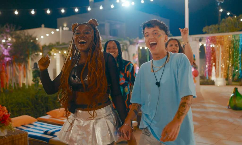 I Kissed A Girl still, two couples holding hands