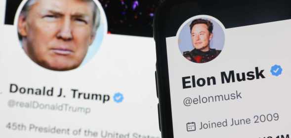 Donald Trump Twitter account displayed on a laptop screen and Elon Musk Twitter account displayed on a phone screen are seen in this illustration photo taken in Krakow, Poland on November 22, 2022. (Photo by Jakub Porzycki/NurPhoto via Getty Images)