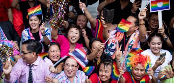People attend the 'Love Pride Parade' in Bangkok, Thailand in June 2024