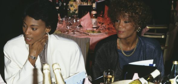 Robyn Crawford, left, and American singer Whitney Houston