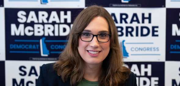 Sarah McBride smiles directly at the camera.