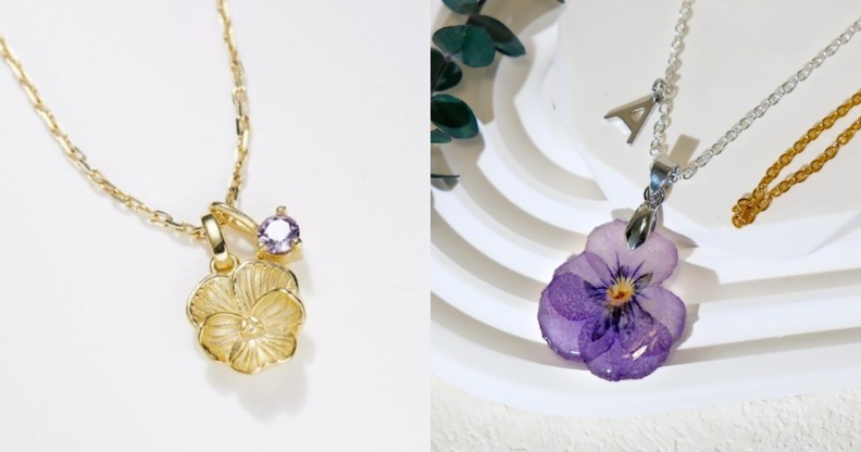 A gold violet necklace with a violet shaped charm and a violet coloured charm on the chain and a necklace of a dried violet flower sealed in resin.