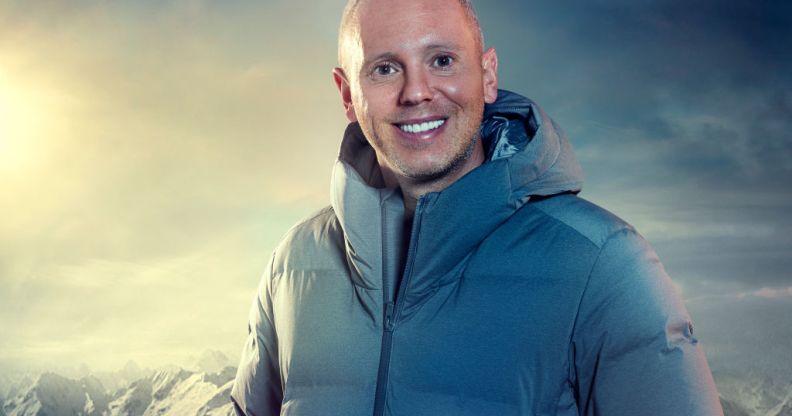 Rob Rinder in a thermal jacket with a mountain backdrop
