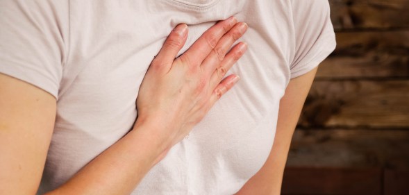 Woman having chest pain.