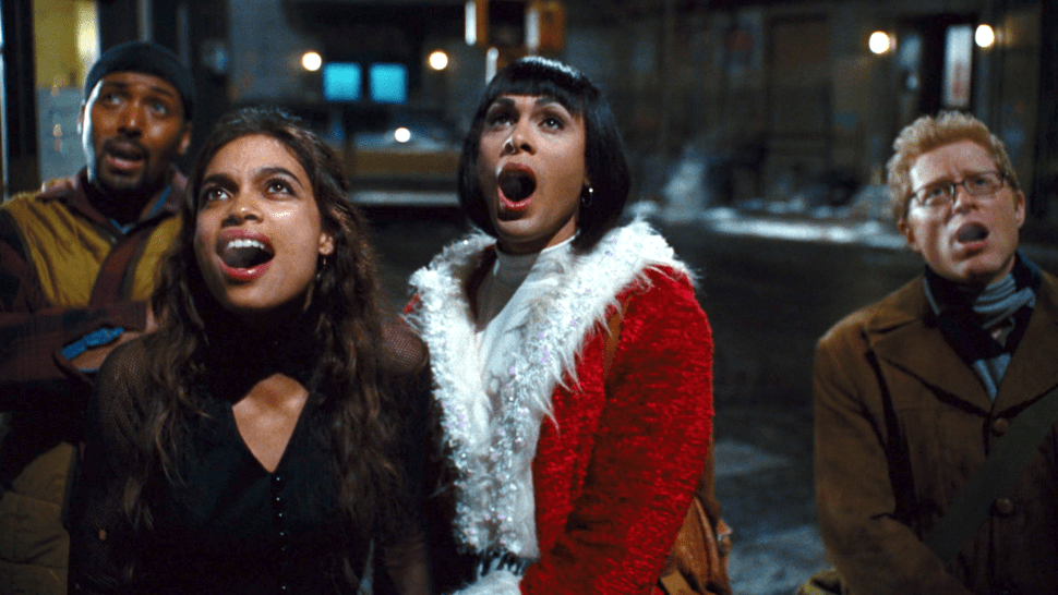 Rent stars singing up at their appartment in the snow