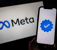 SANTA ROSA, PHILIPPINES - JANUARY 08: In this photo illustration, the Meta logo and its verified logo are seen on screens on January 08, 2025 in Santa Rosa, Philippines. Meta has announced the discontinuation of its fact-checking program, transitioning to a community-driven model that relies on users to add context to potentially misleading posts, a move aimed at promoting free expression. This significant policy shift has raised concerns among experts about the potential increase in misinformation and hate speech on Meta's platforms, including Facebook and Instagram, as the company prepares for a new political landscape under the upcoming Trump presidency. (Photo illustration by Ezra Acayan/Getty Images)