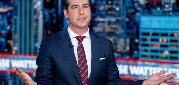 Jesse Watters shrugging his shoulders.